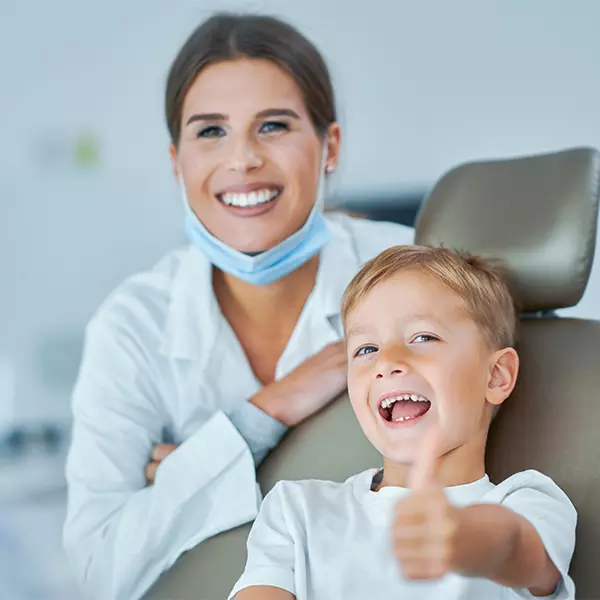 Home 2 Dentist with a smiling child patient